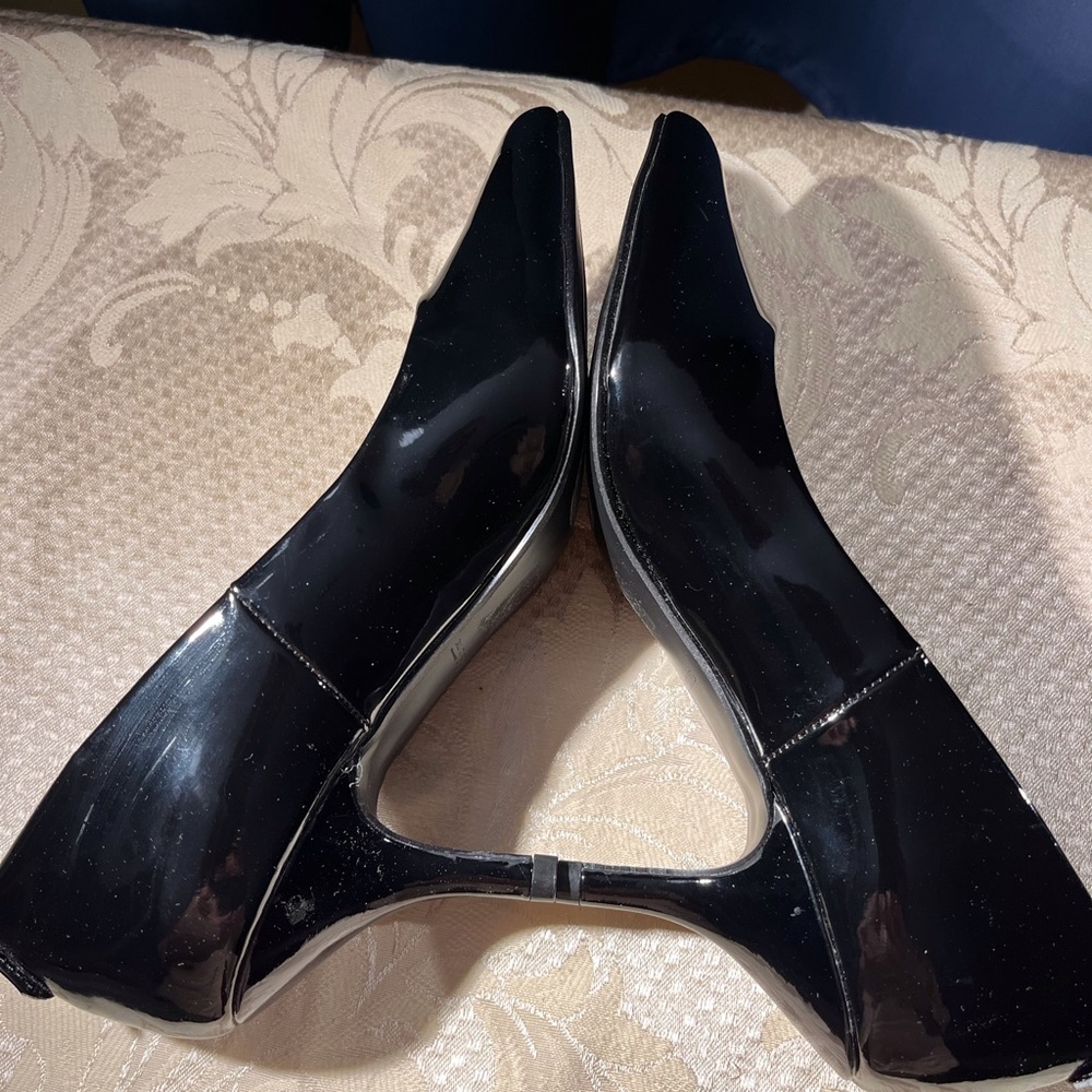 Black patent leather shoes from Call it Spring. Size 7.5